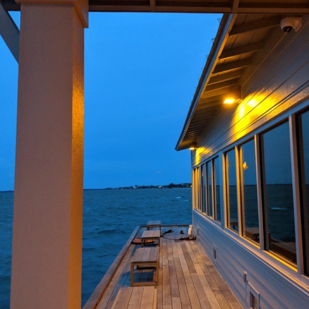 590nm-amber-sea-turtle-safe-LED-wall-pack Dark sky 590nm Amber LED wall packs over by a deck over the ocean