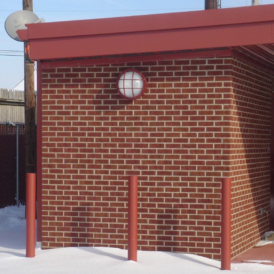 Bulkhead-LED-wall-pack-mounted-on-wall Bulkhead LED wall pack mounted on brick wall