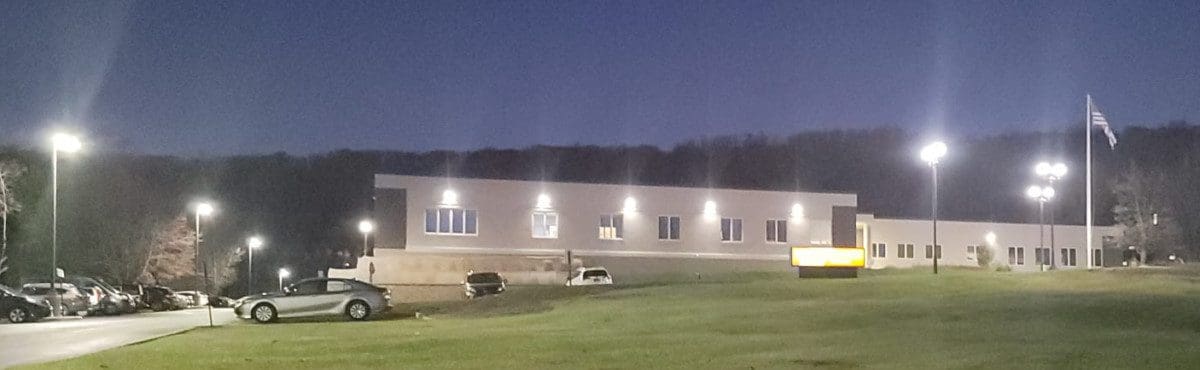 highbayswarehouseslider LED lighting controls reduce energy use and extend the useful life of LED fixtures